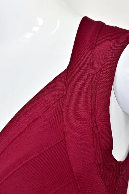 Woman wearing a figure flattering  Sabrina Bandage Top - Red Wine BODYCON COLLECTION Pty Ltd
