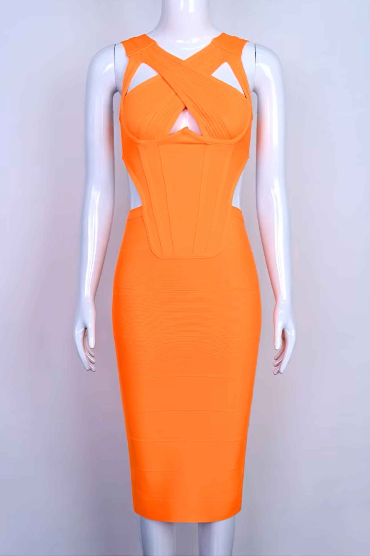 Woman wearing a figure flattering  Sasha Bandage Midi Dress - Apricot Orange BODYCON COLLECTION