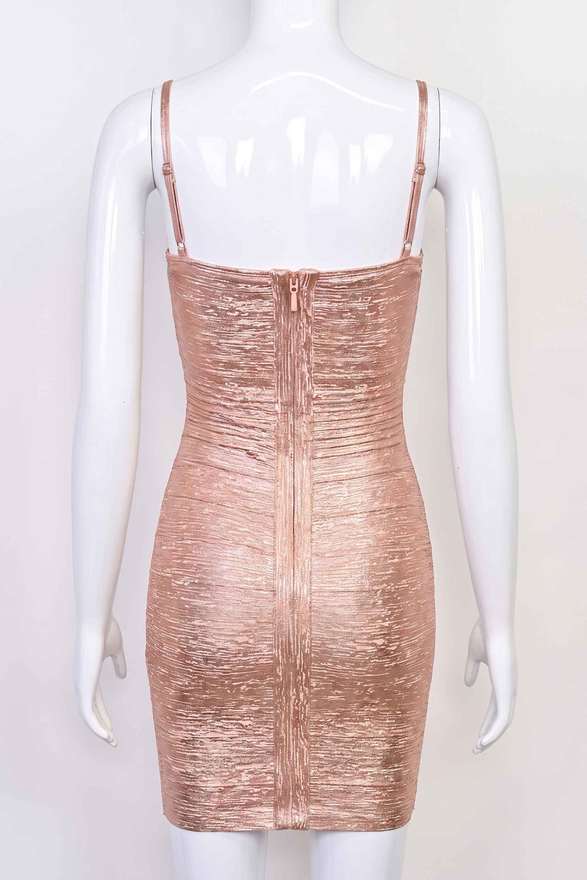 Woman wearing a figure flattering  Scarlett Bandage Mini Dress - Rose Gold BODYCON COLLECTION Pty Ltd