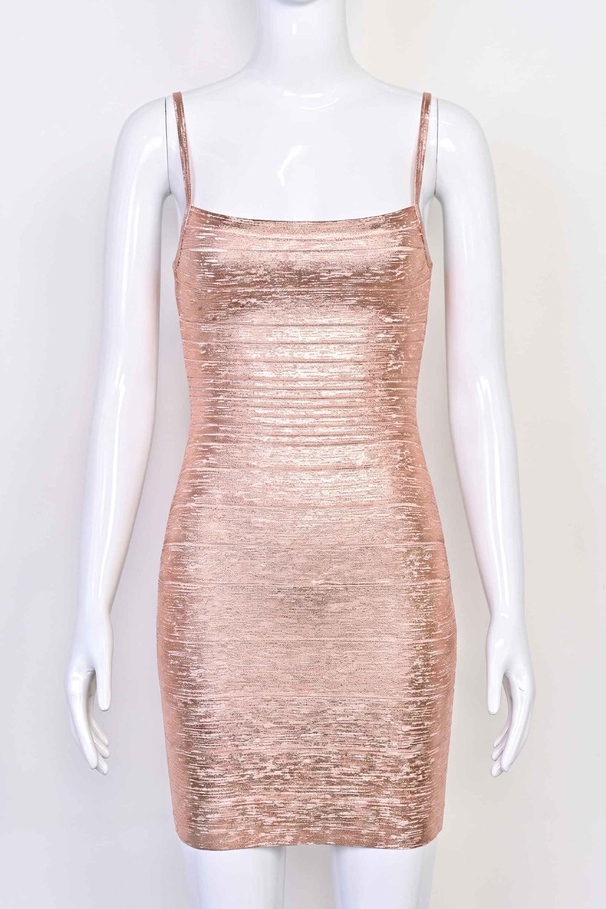 Woman wearing a figure flattering  Scarlett Bandage Mini Dress - Rose Gold BODYCON COLLECTION Pty Ltd