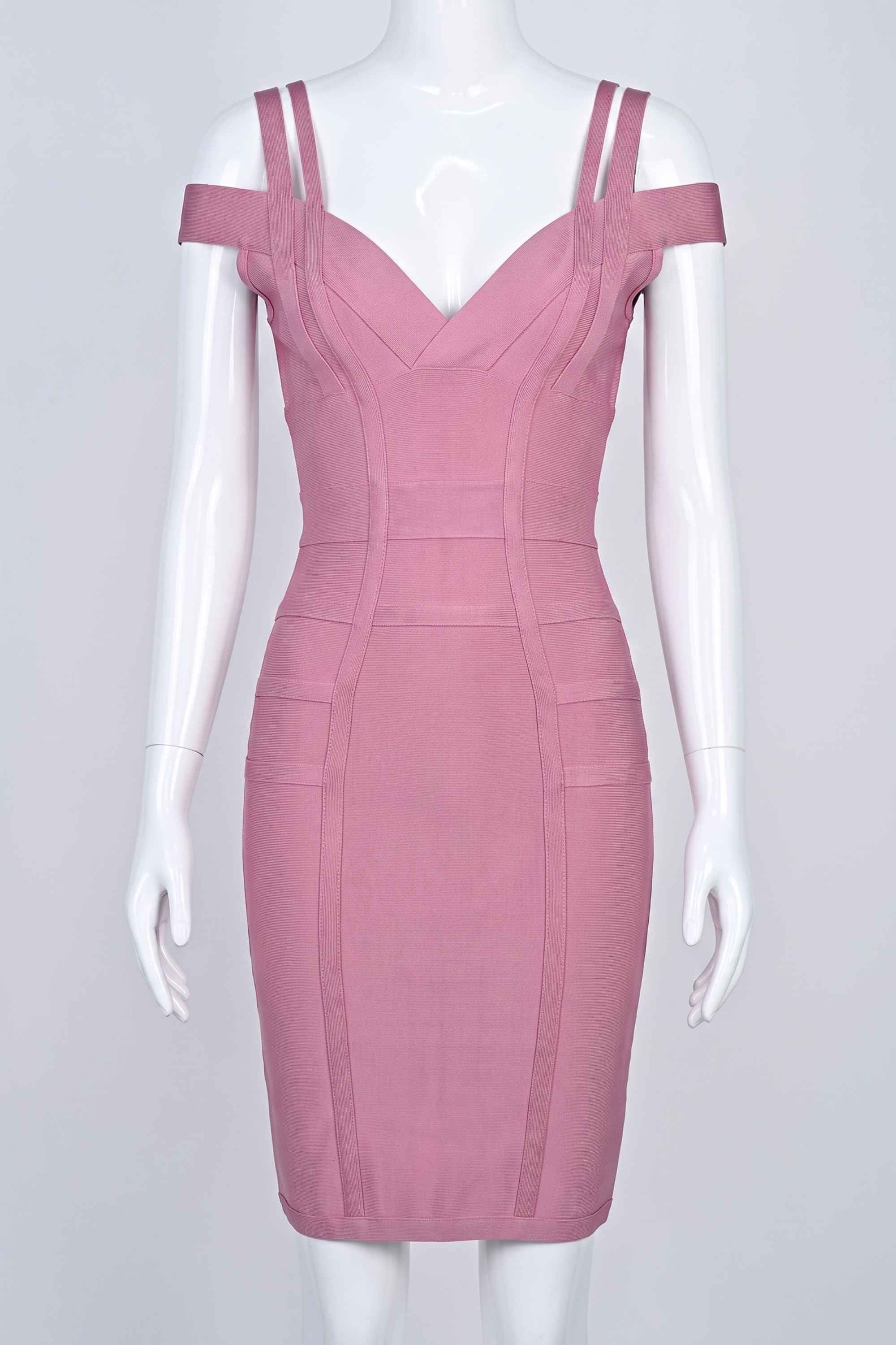 Woman wearing a figure flattering  Sia Bandage Dress - Ballet Pink Bodycon Collection