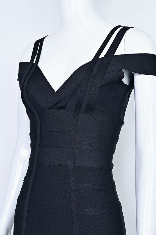 Woman wearing a figure flattering  Sia Bandage Dress - Classic Black Bodycon Collection