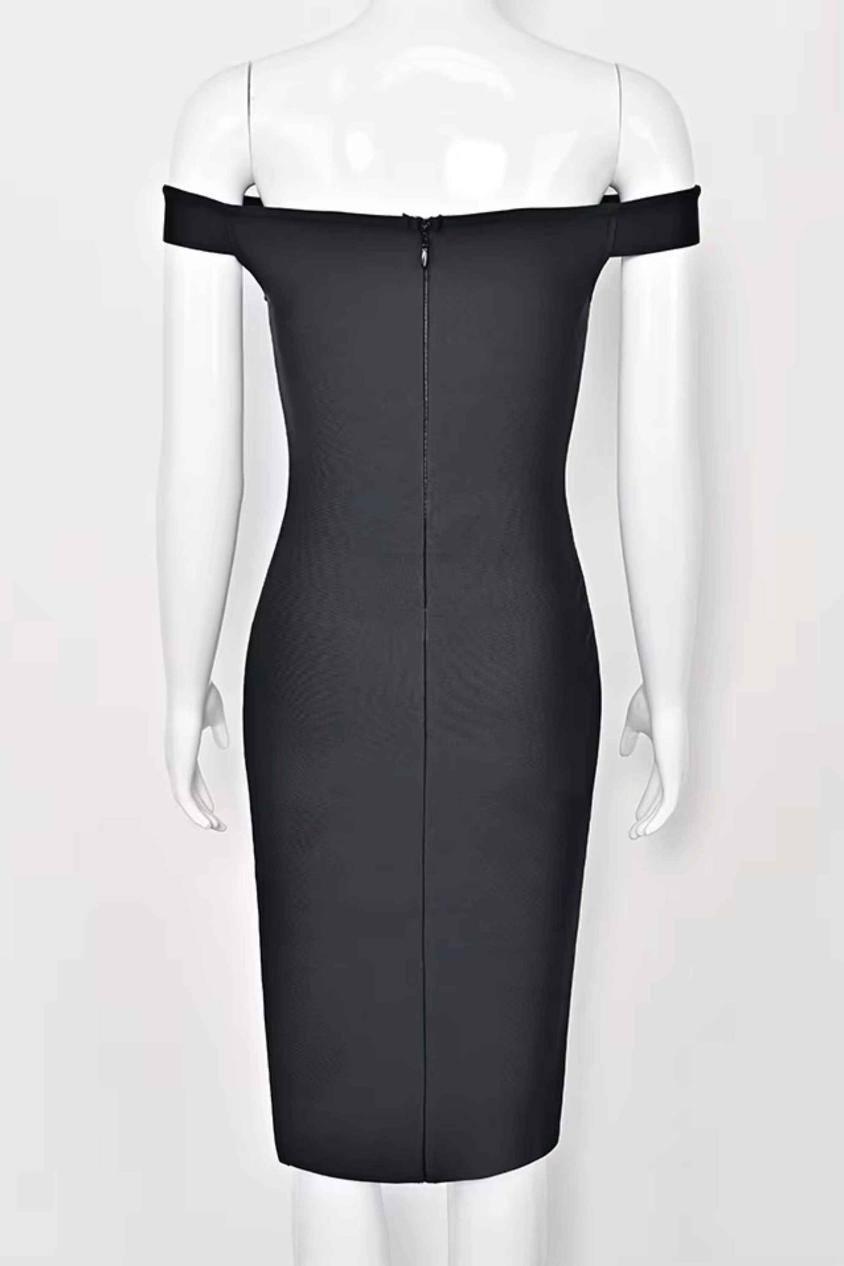 Woman wearing a figure flattering  Sofie Off Shoulder Bodycon Dress - Classic Black BODYCON COLLECTION