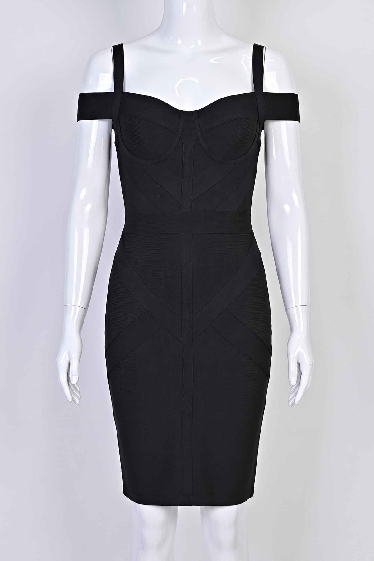 Woman wearing a figure flattering  Sophia Bandage Dress - Classic Black Bodycon Collection