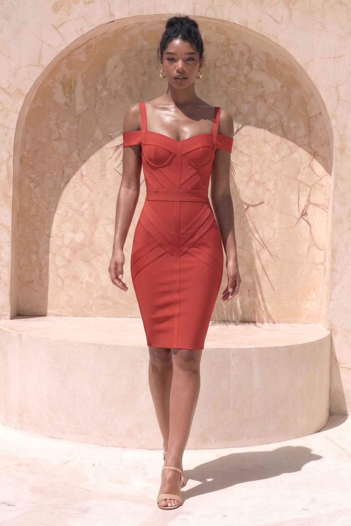 Woman wearing a figure flattering  Sophia Bandage Dress - Lipstick Red Bodycon Collection