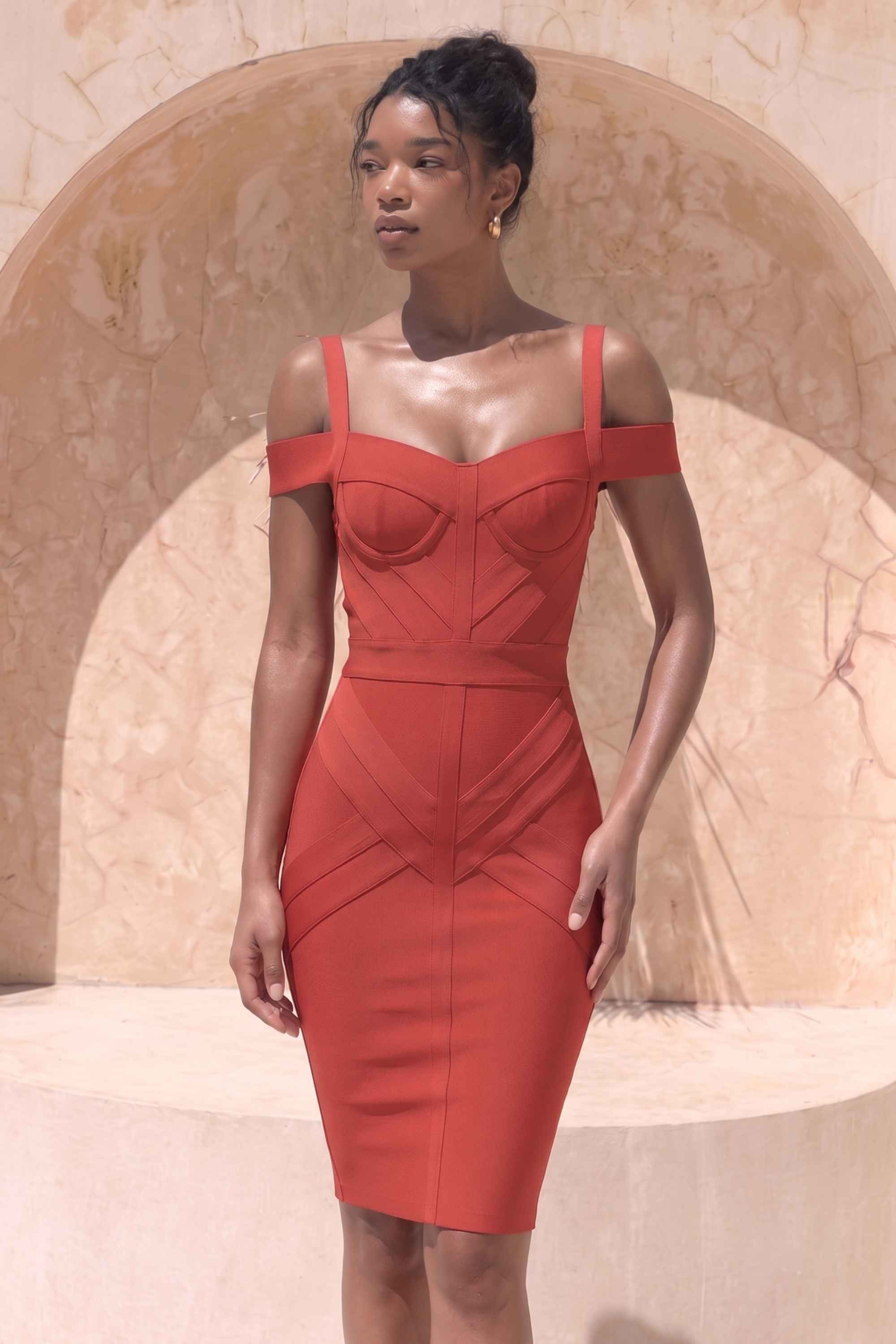 Woman wearing a figure flattering  Sophia Bandage Dress - Lipstick Red Bodycon Collection