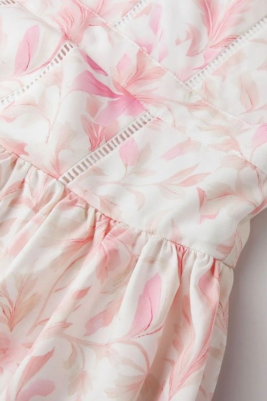 Woman wearing a figure flattering  Tasmin Midi Dress - Pink Print BODYCON COLLECTION