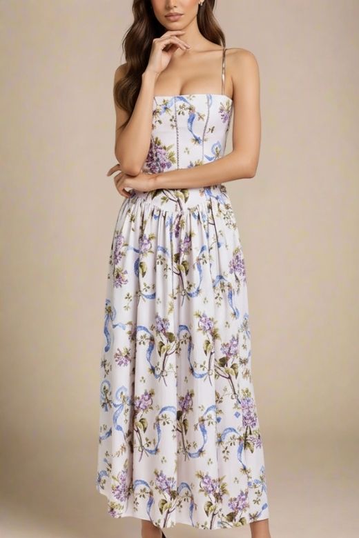 Woman wearing a figure flattering  Tasmin Midi Dress - White Floral BODYCON COLLECTION