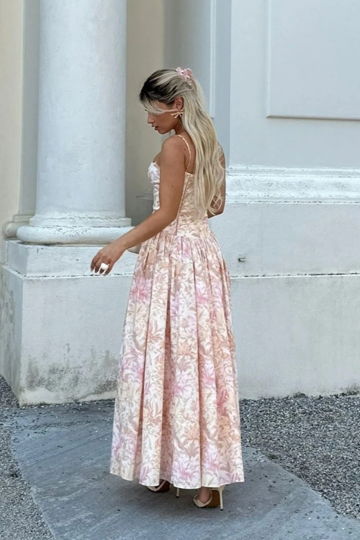 Woman wearing a figure flattering  Tasmin Midi Dress - White Pearl BODYCON COLLECTION