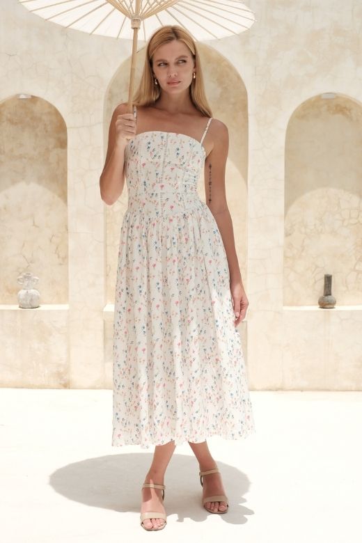 Woman wearing a figure flattering  Tasmin Midi Dress - White Pearl BODYCON COLLECTION