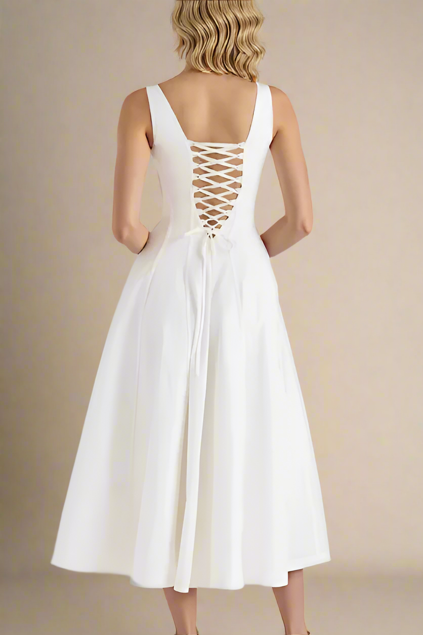 Woman wearing a figure flattering  Willa Bodycon Midi Dress - White Pearl BODYCON COLLECTION Pty Ltd