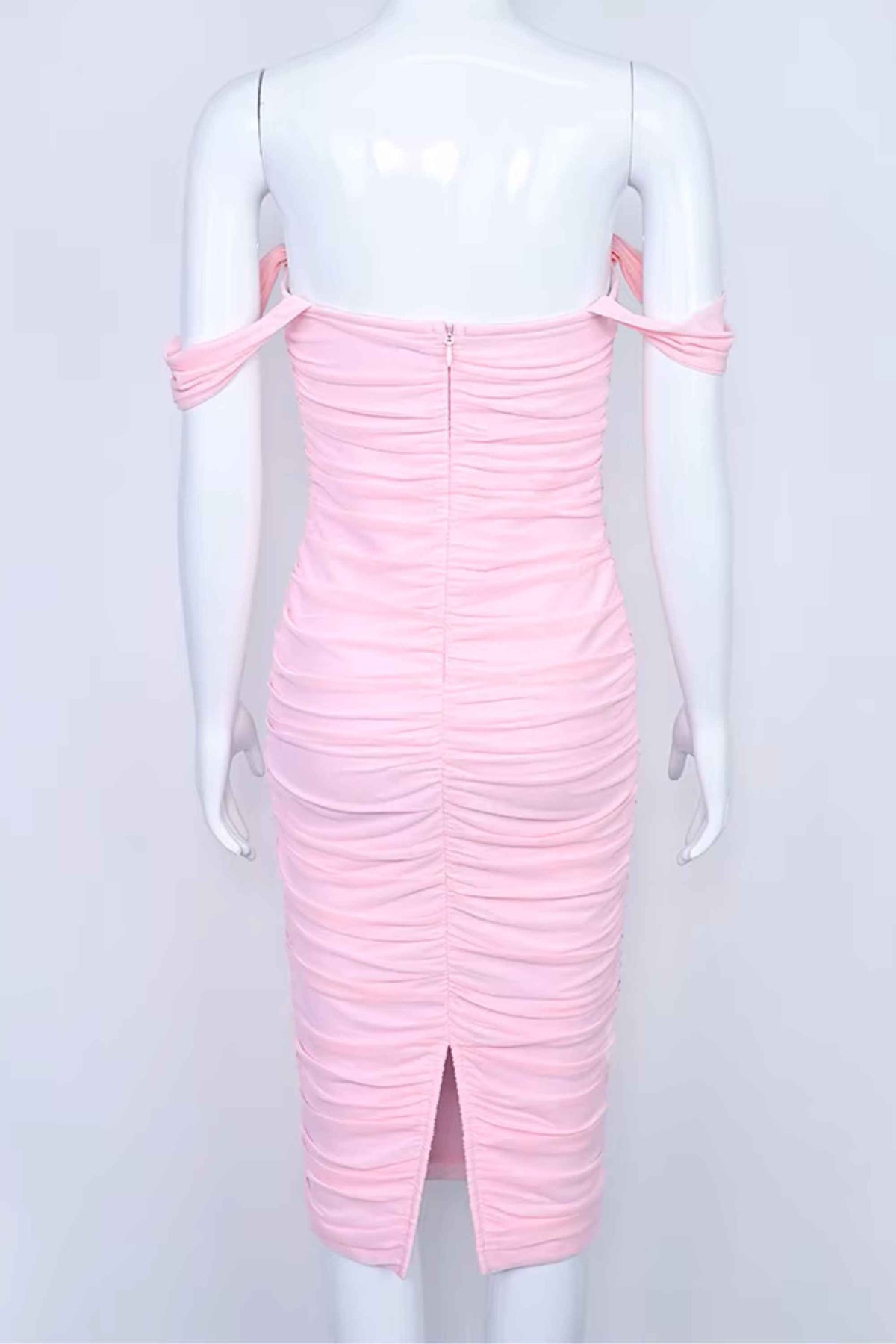 Woman wearing a figure flattering  Zia Bodycon Wrap Midi Dress - Dusty Pink Bodycon Collection